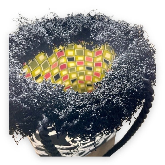 SMALL, REVERSIBLE, CANVAS PURSE. MEASURES AT BASE, 7”W X 4”D X 10”H. NO BRAND. - Picture 4 of 7